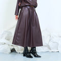 Faux-leather pleated midi skirt with side pockets