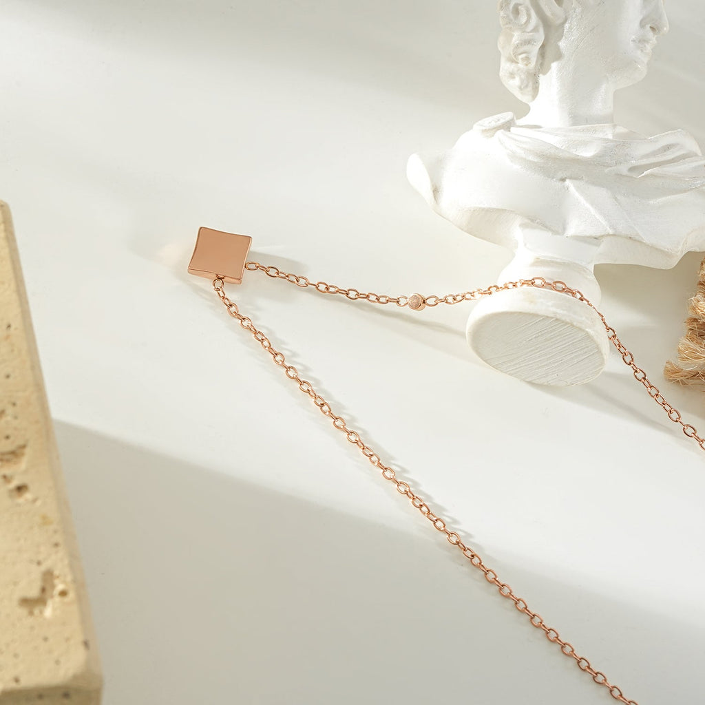 LAVINIA Gold: Square Gold Pendant Necklace with Cut-Away Shell Star and Mini Zirconia Charm