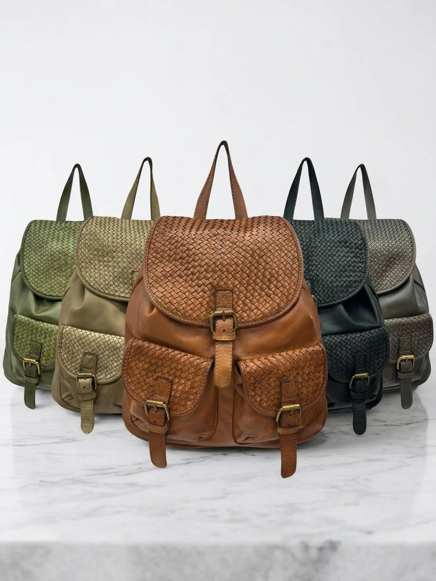 Basket-weave leather backpack with twin front pockets and buckle flap