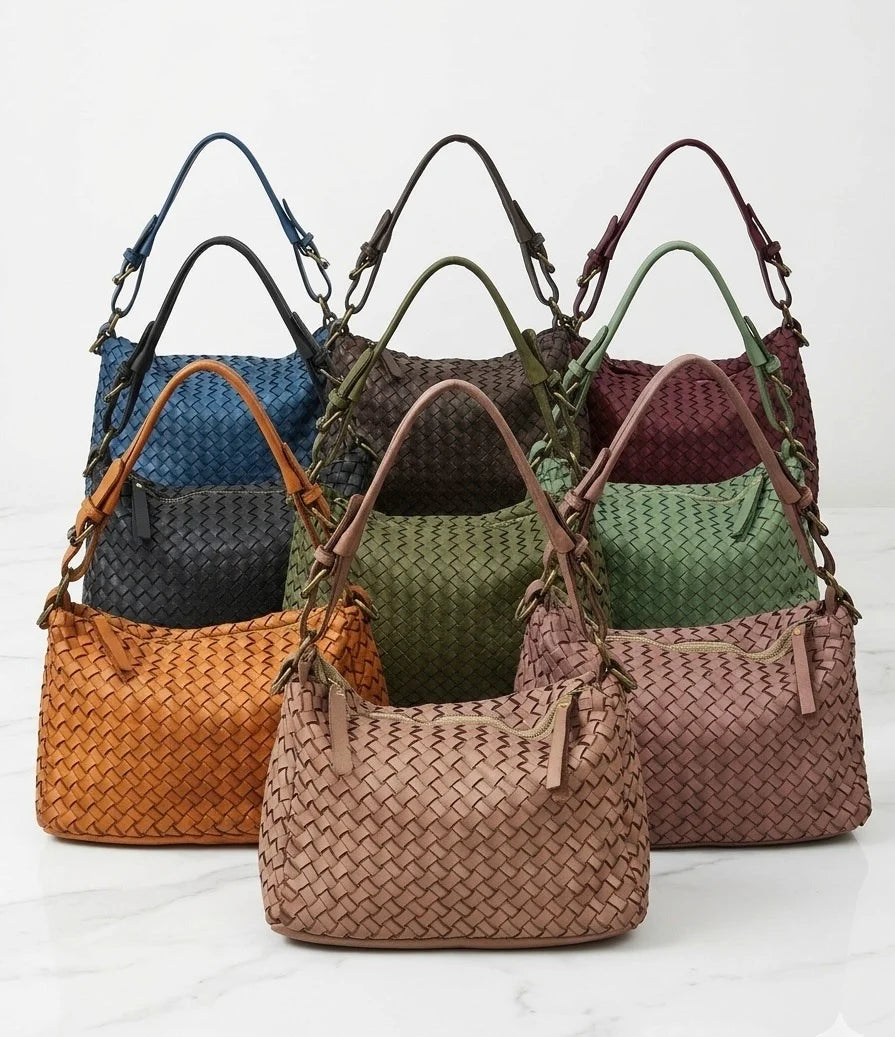 Interwoven leather shoulder bag with articulated ring strap