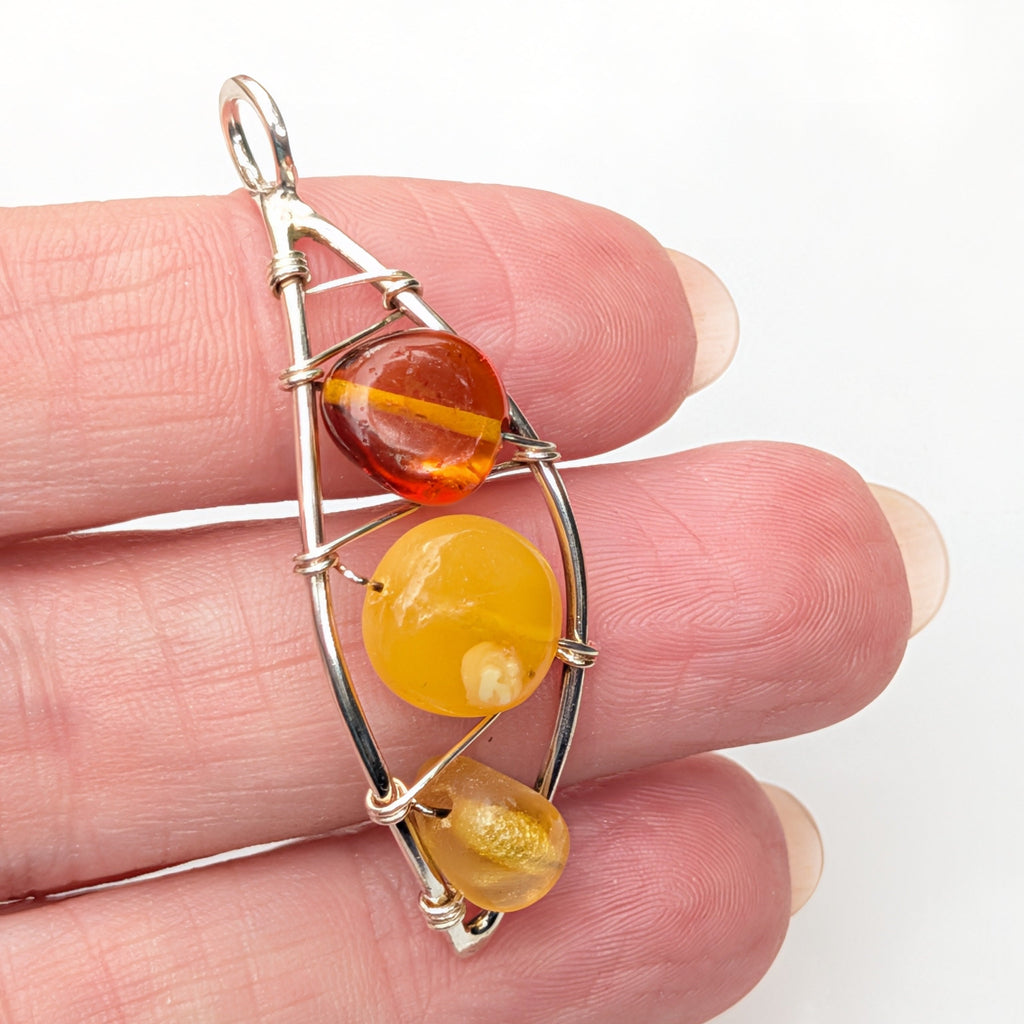 Heliad Pendant — Baltic Amber & Sterling Silver