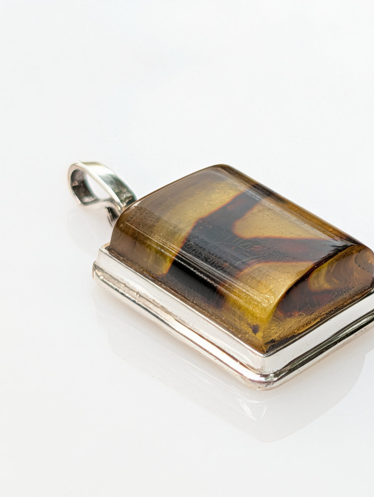 Solar Vein Pendant — Baltic Amber & Sterling Silver