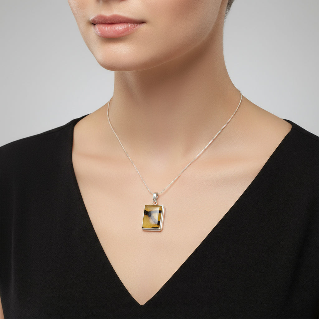 Solar Vein Pendant — Baltic Amber & Sterling Silver