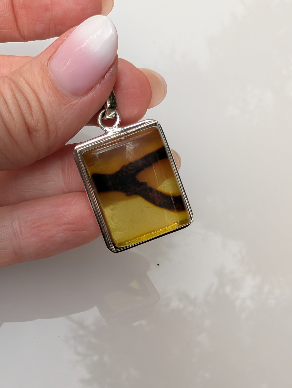 Solar Vein Pendant — Baltic Amber & Sterling Silver