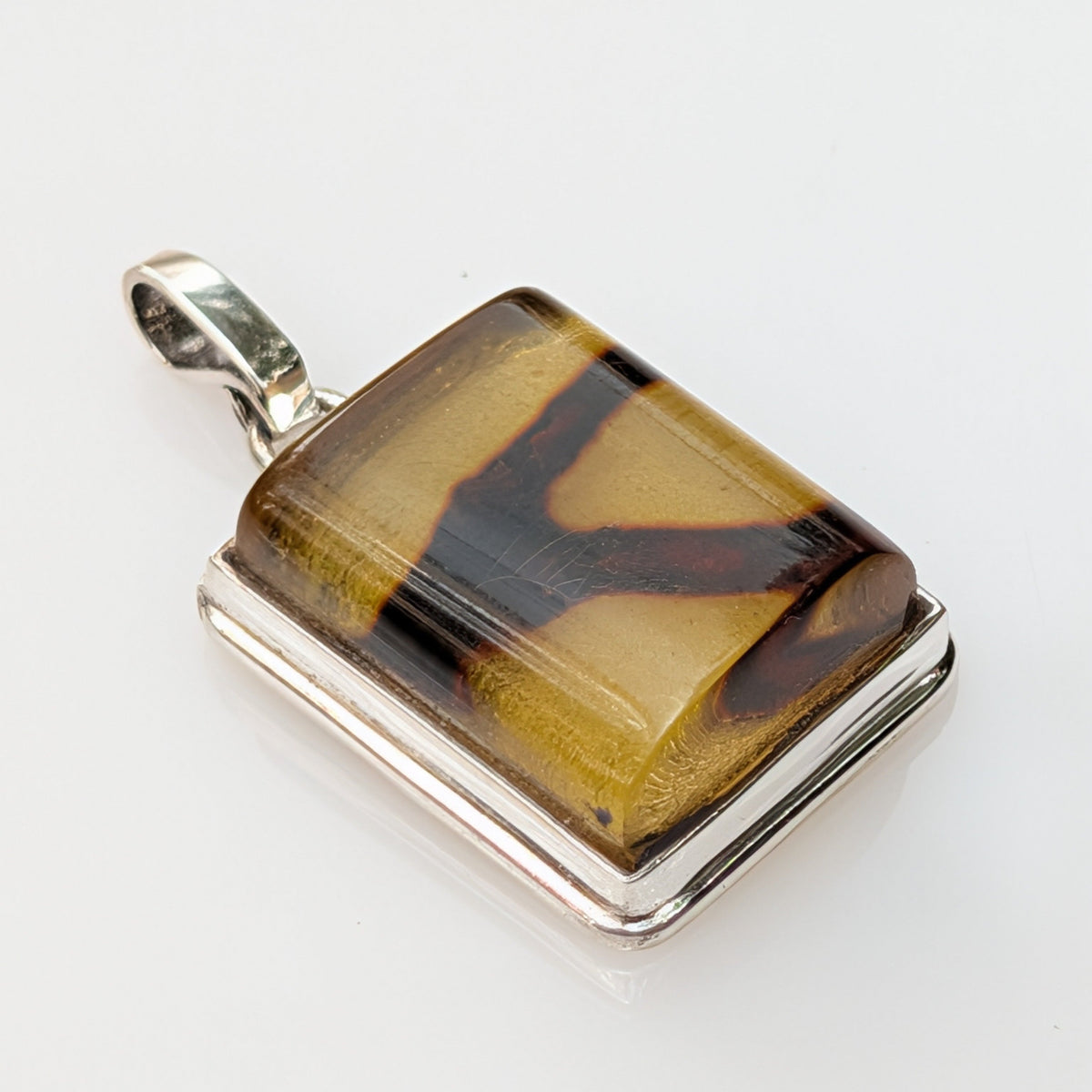 Solar Vein Pendant — Baltic Amber & Sterling Silver