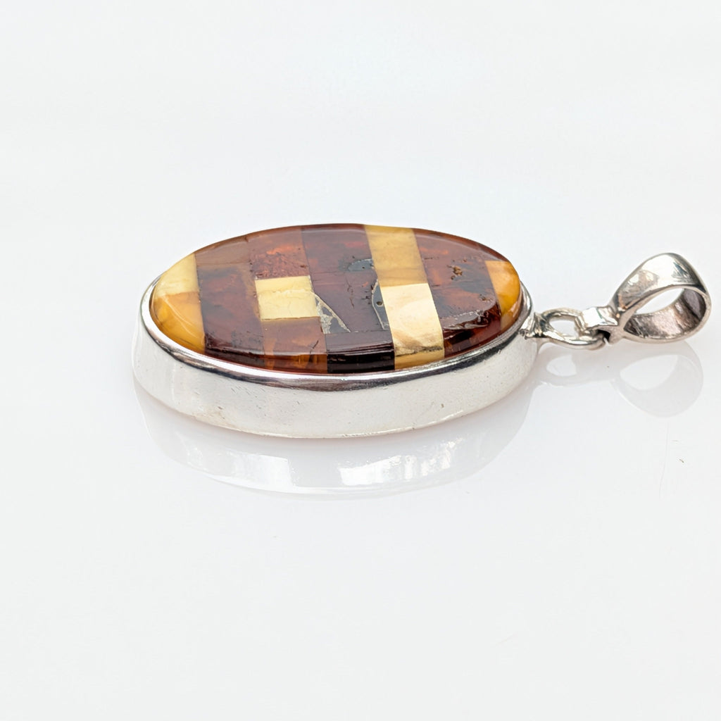 Solar Tapestry Pendant — Baltic Amber & Sterling Silver