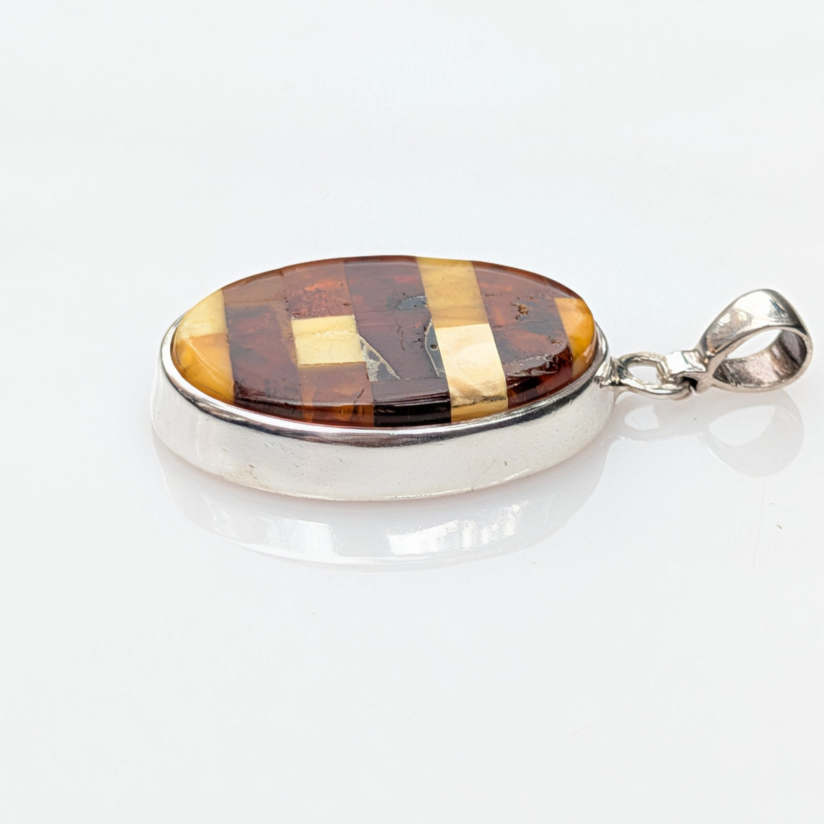 Solar Tapestry Pendant — Baltic Amber & Sterling Silver